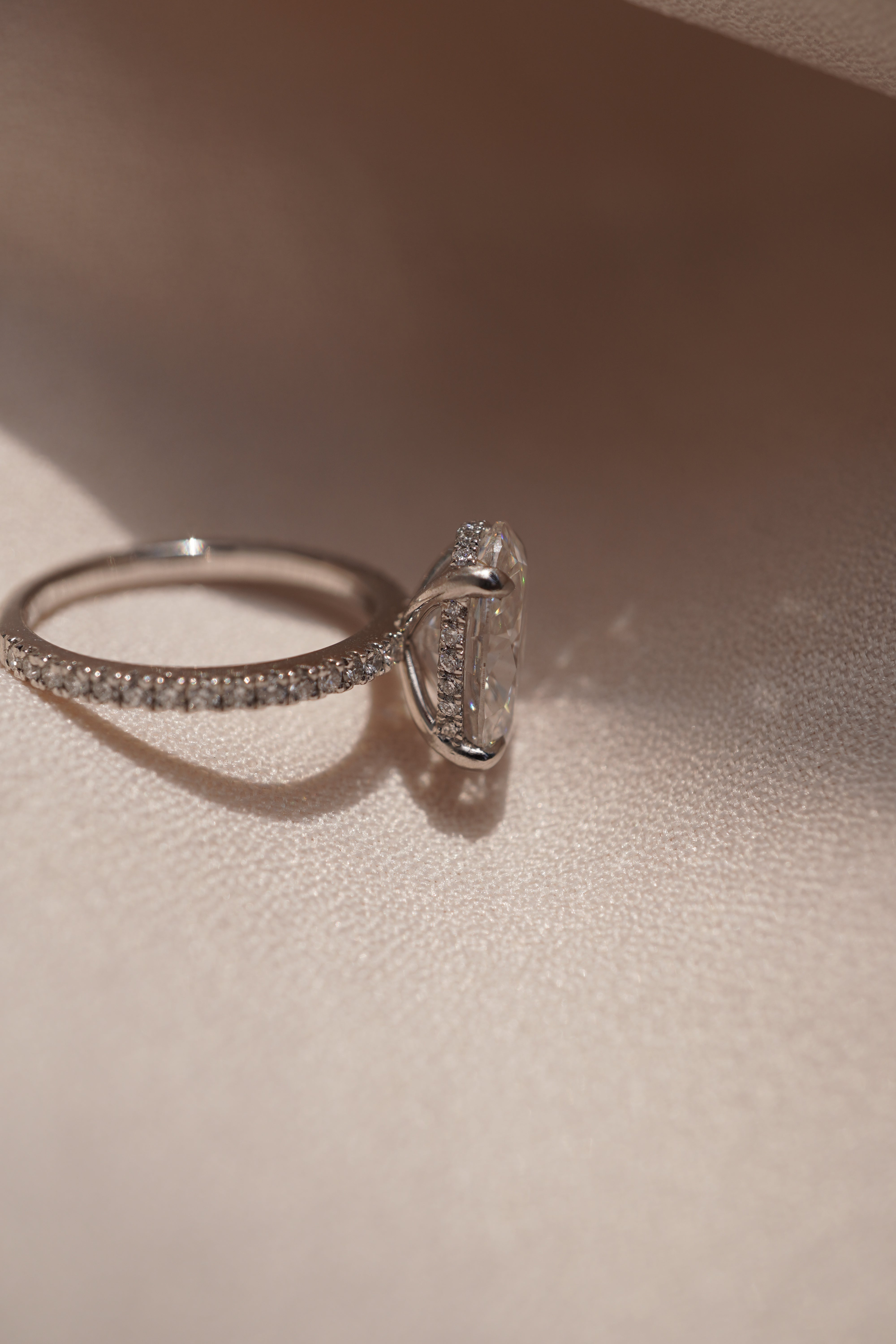 Oval Accented Solitaire with Hidden Halo