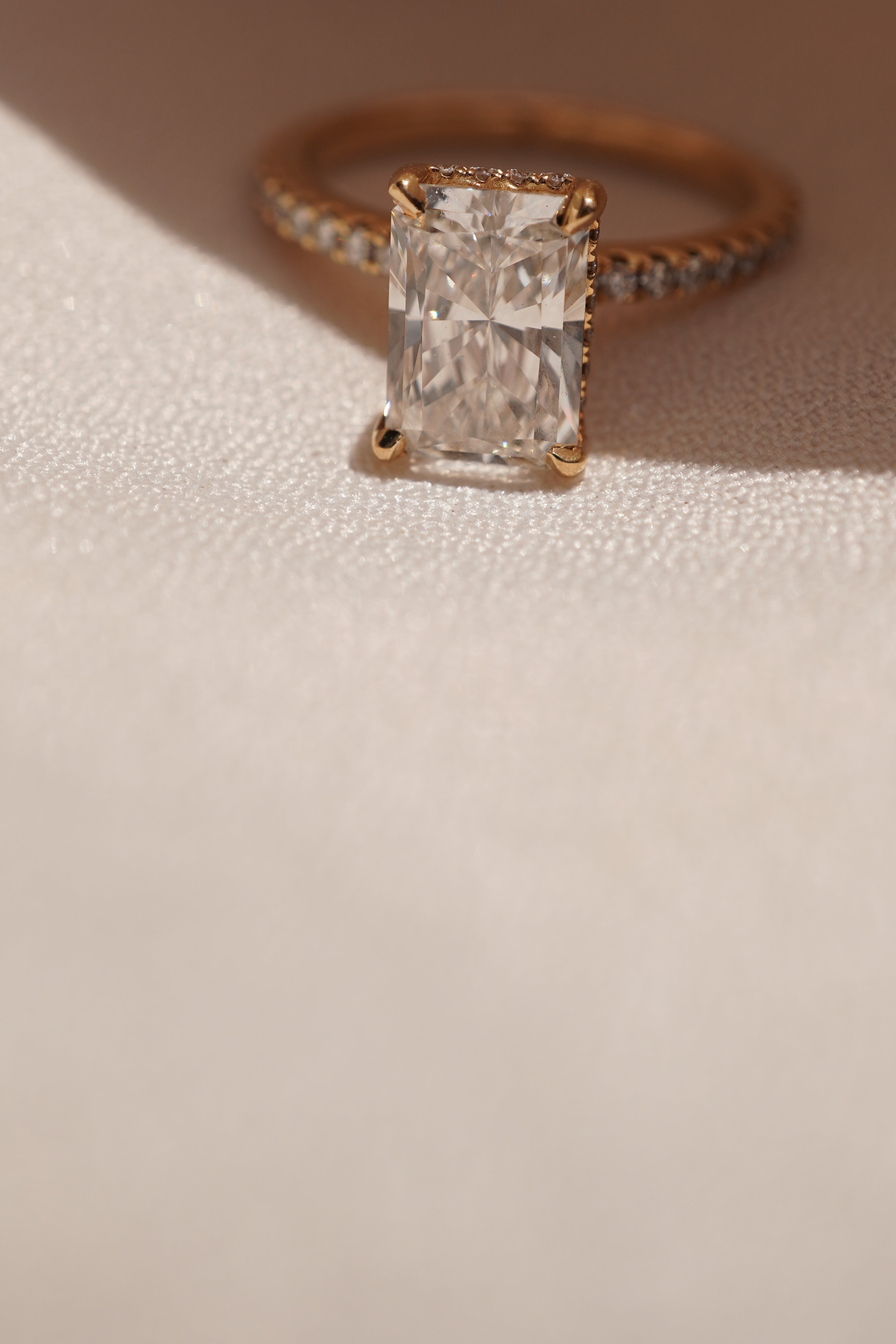 Radiant Accented Solitaire with Hidden Halo