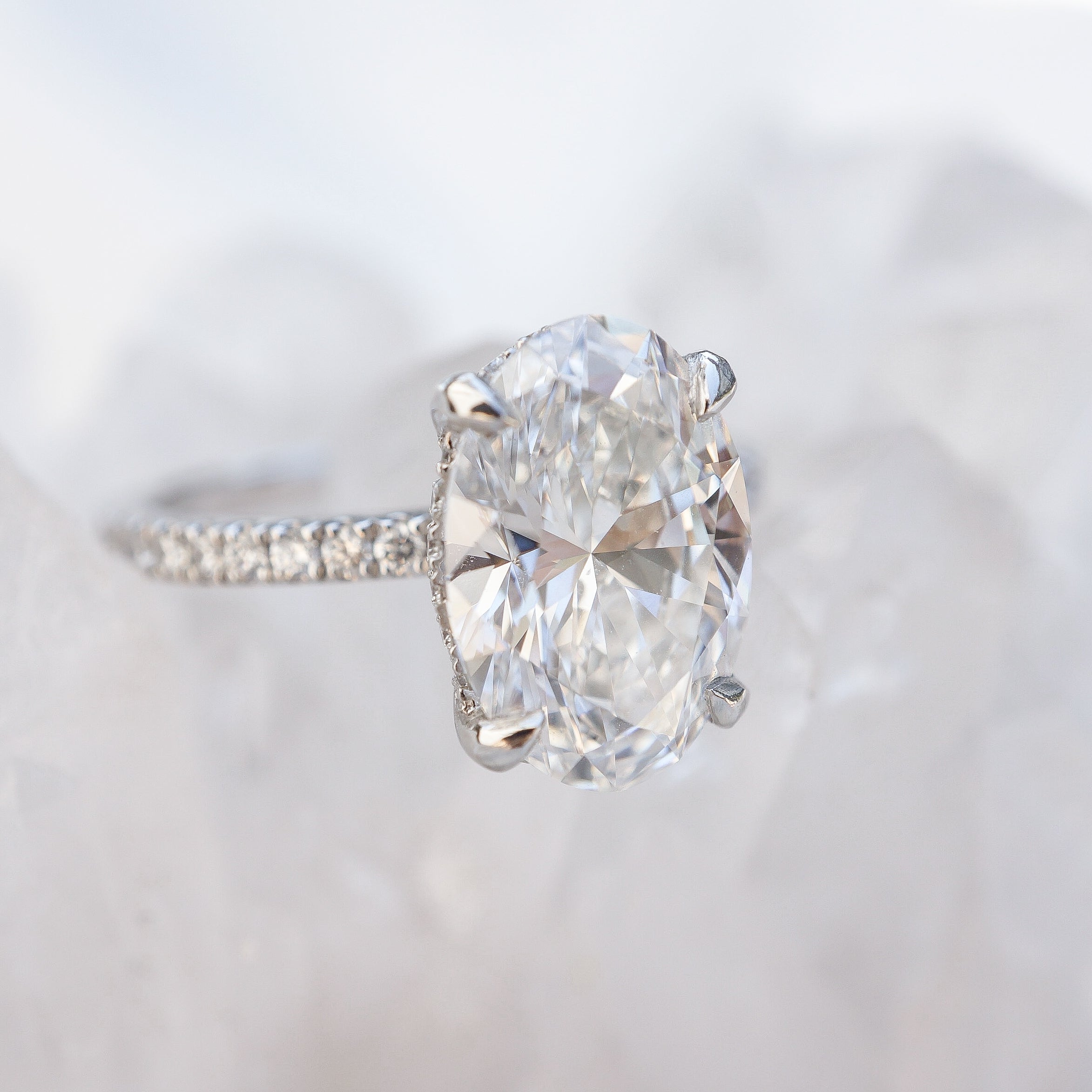 Oval Accented Solitaire with Hidden Halo