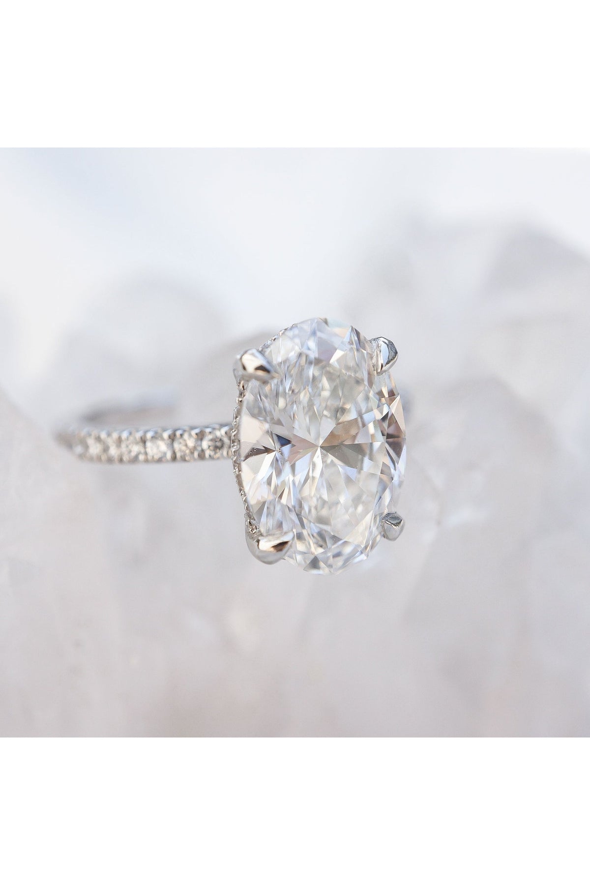 Oval Accented Solitaire with Hidden Halo