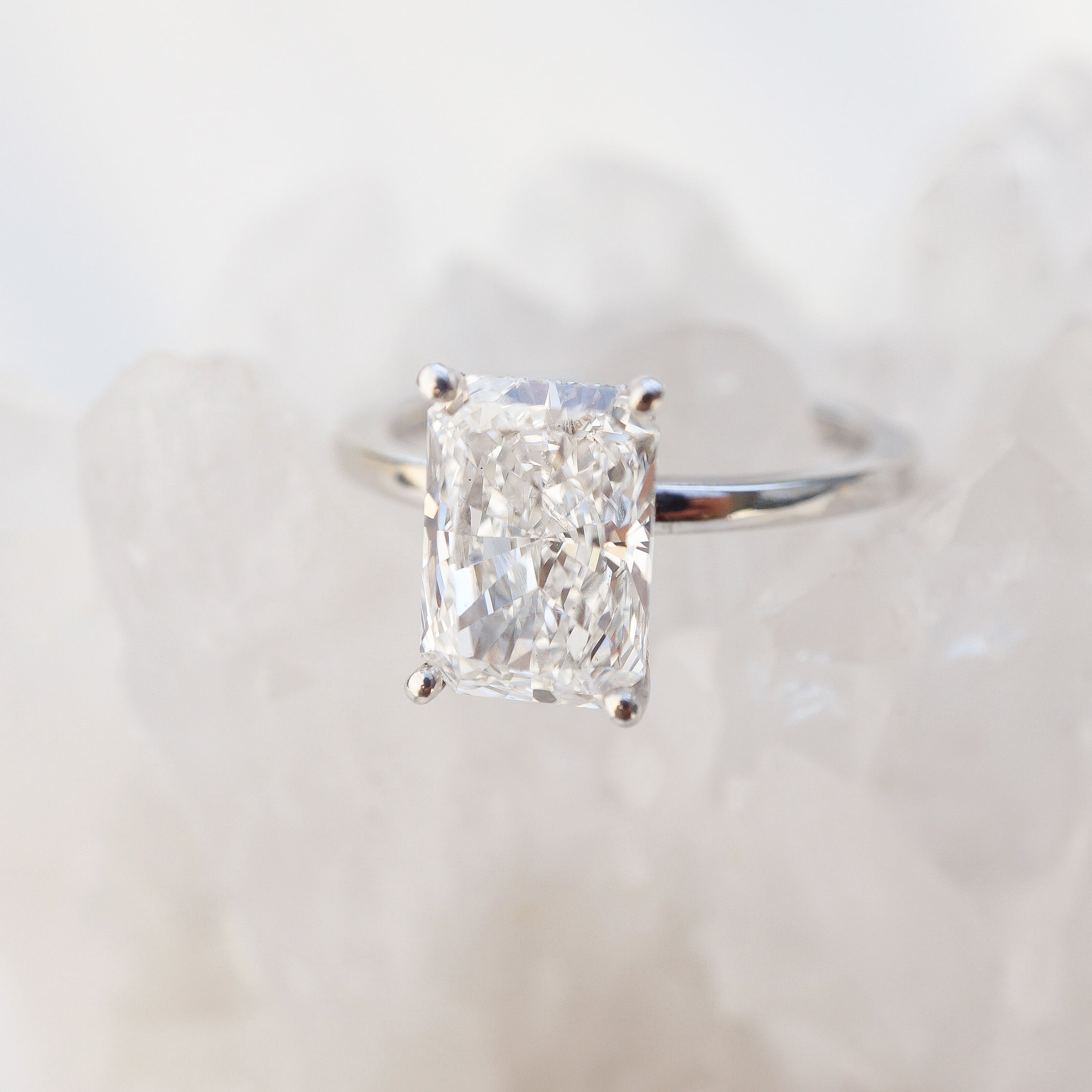 Radiant Solitaire with Hidden Halo