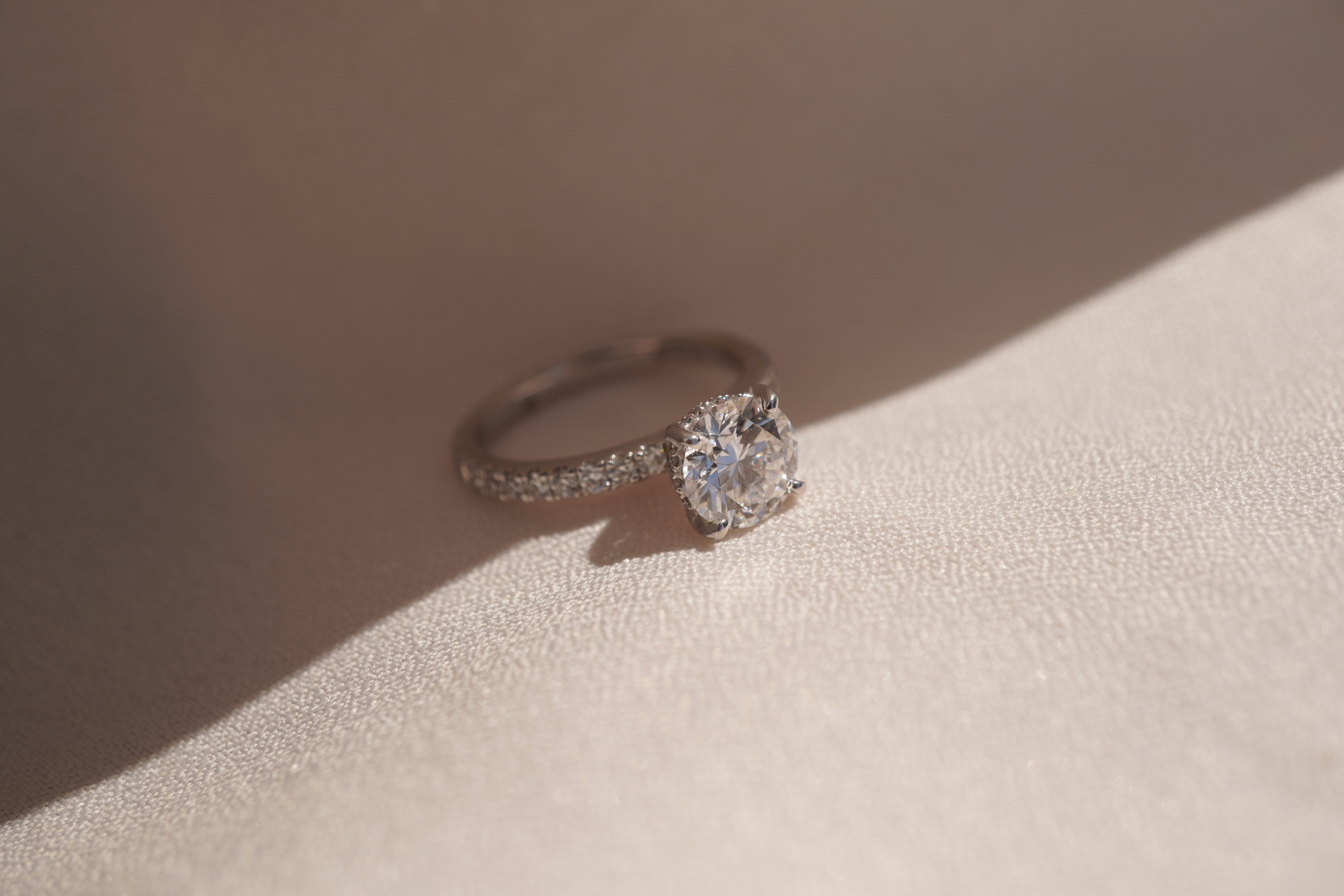 Round Accented Solitaire with Hidden Halo