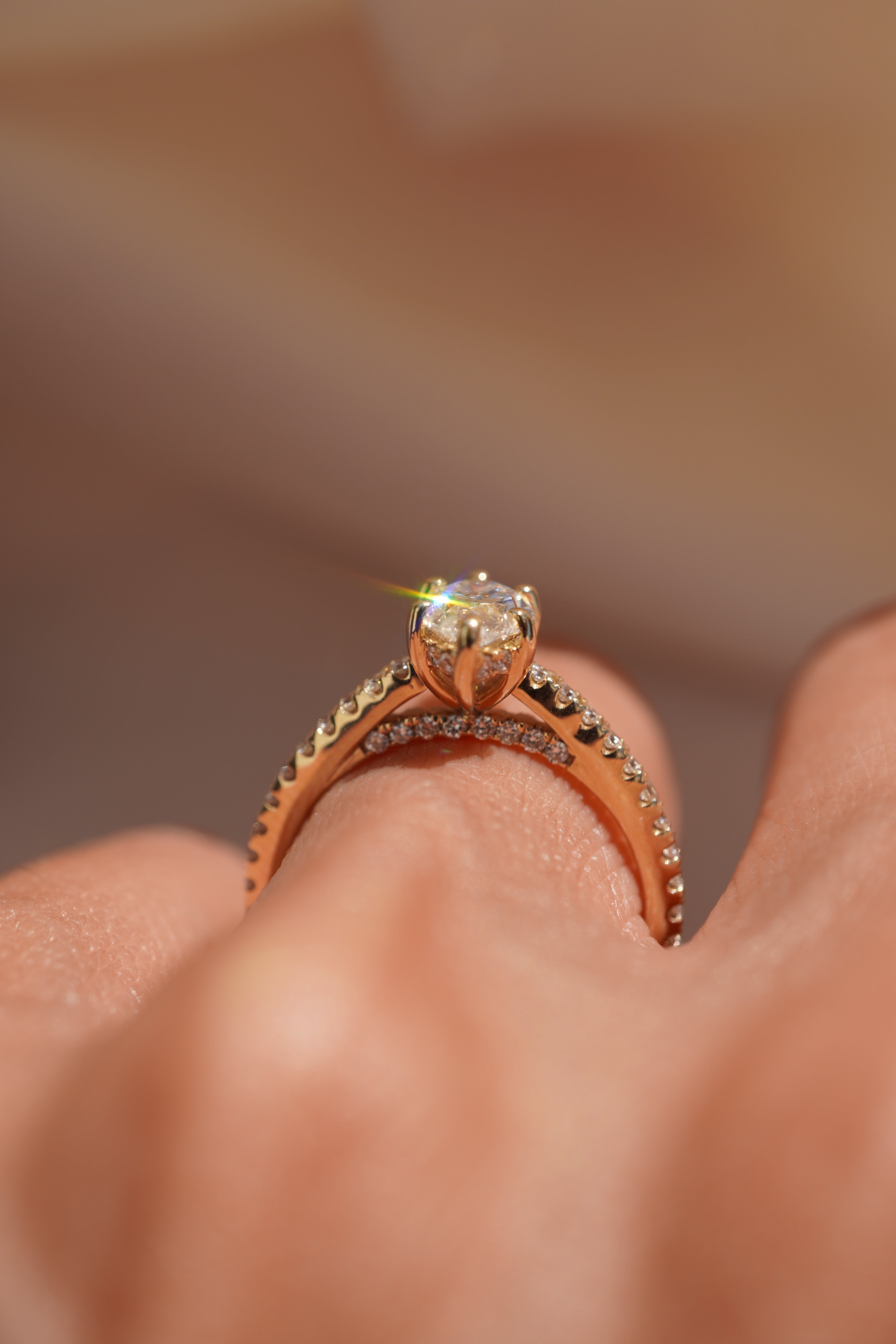 Marquise Accented Solitaire with Hidden Halo and Pave Bridge