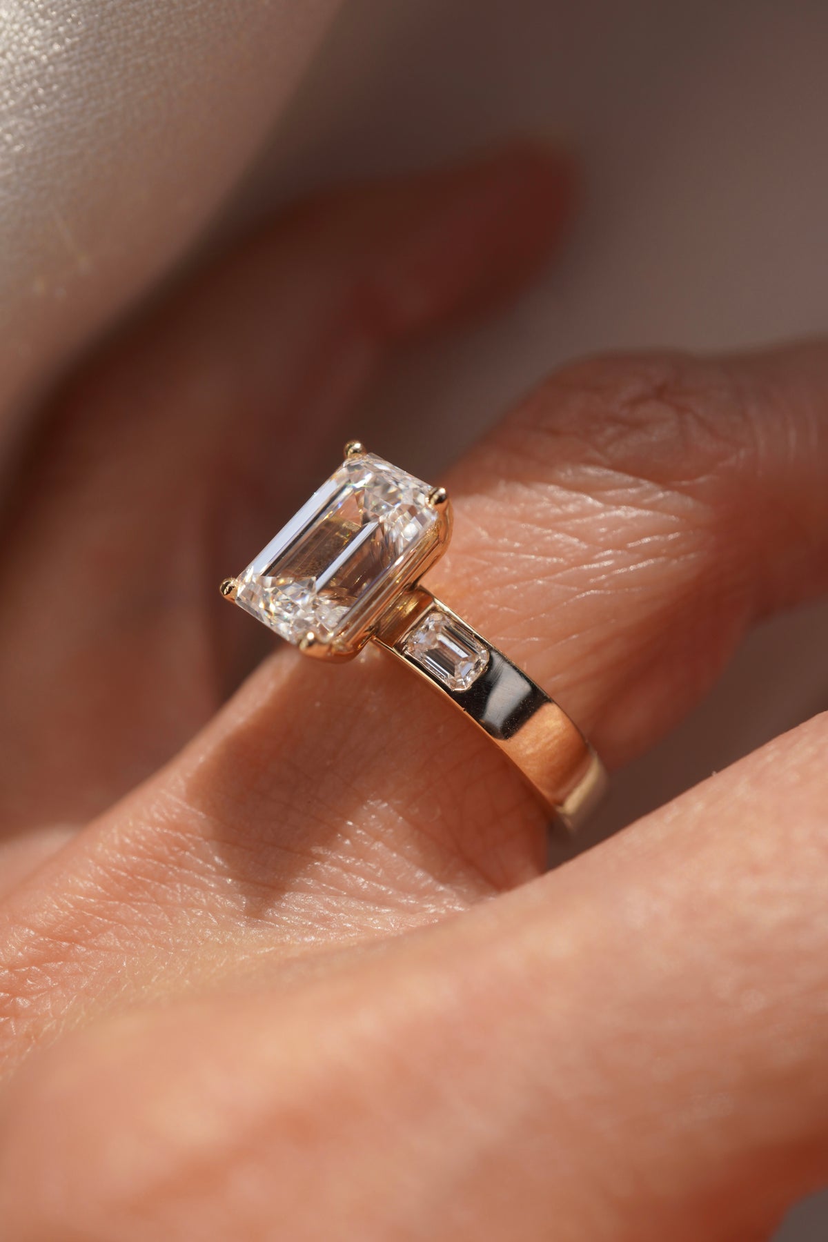 Emerald Three Stone Diamond Engagement Ring
