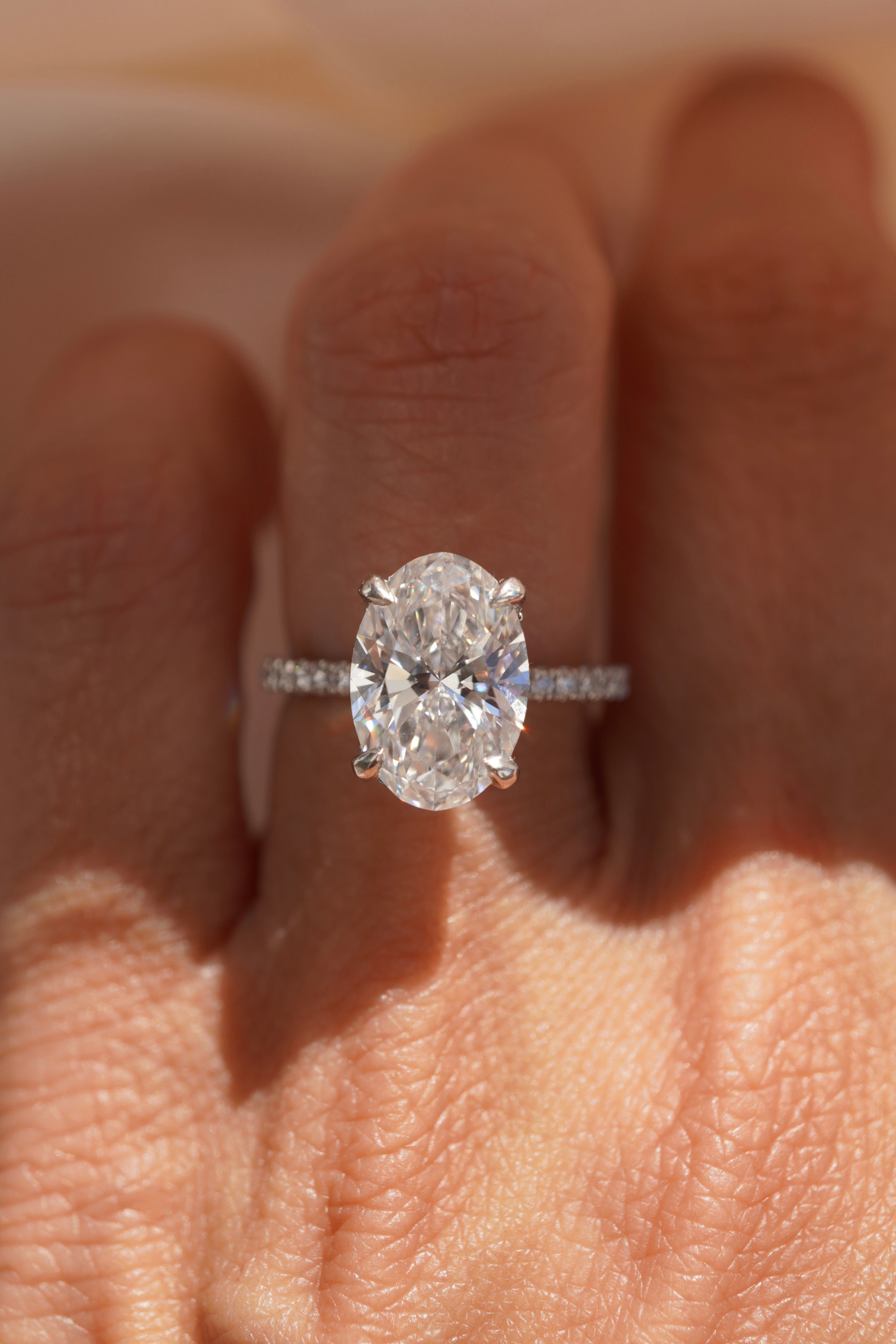 Oval Accented Solitaire with Hidden Halo