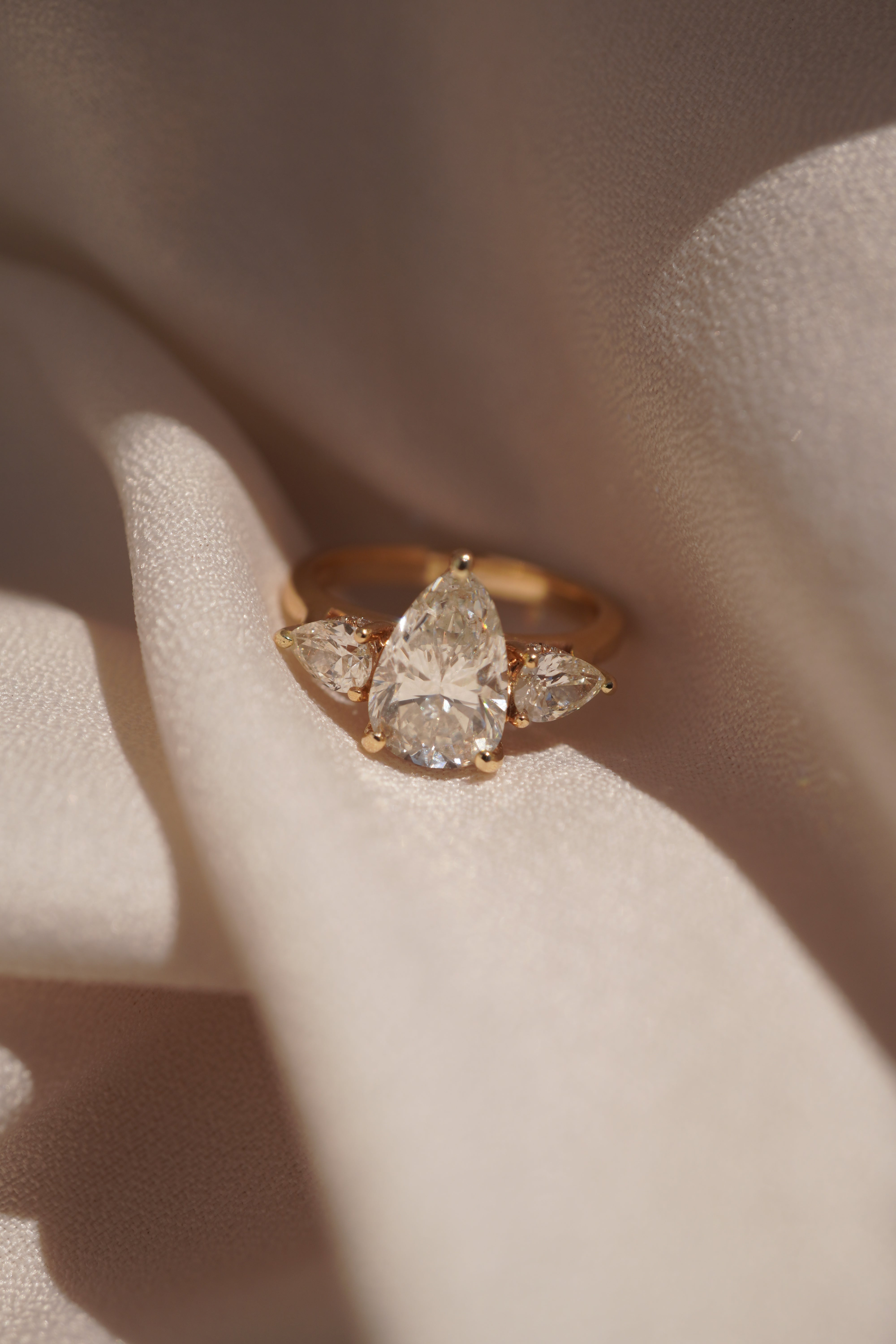 Three Stone Pear Engagement Ring