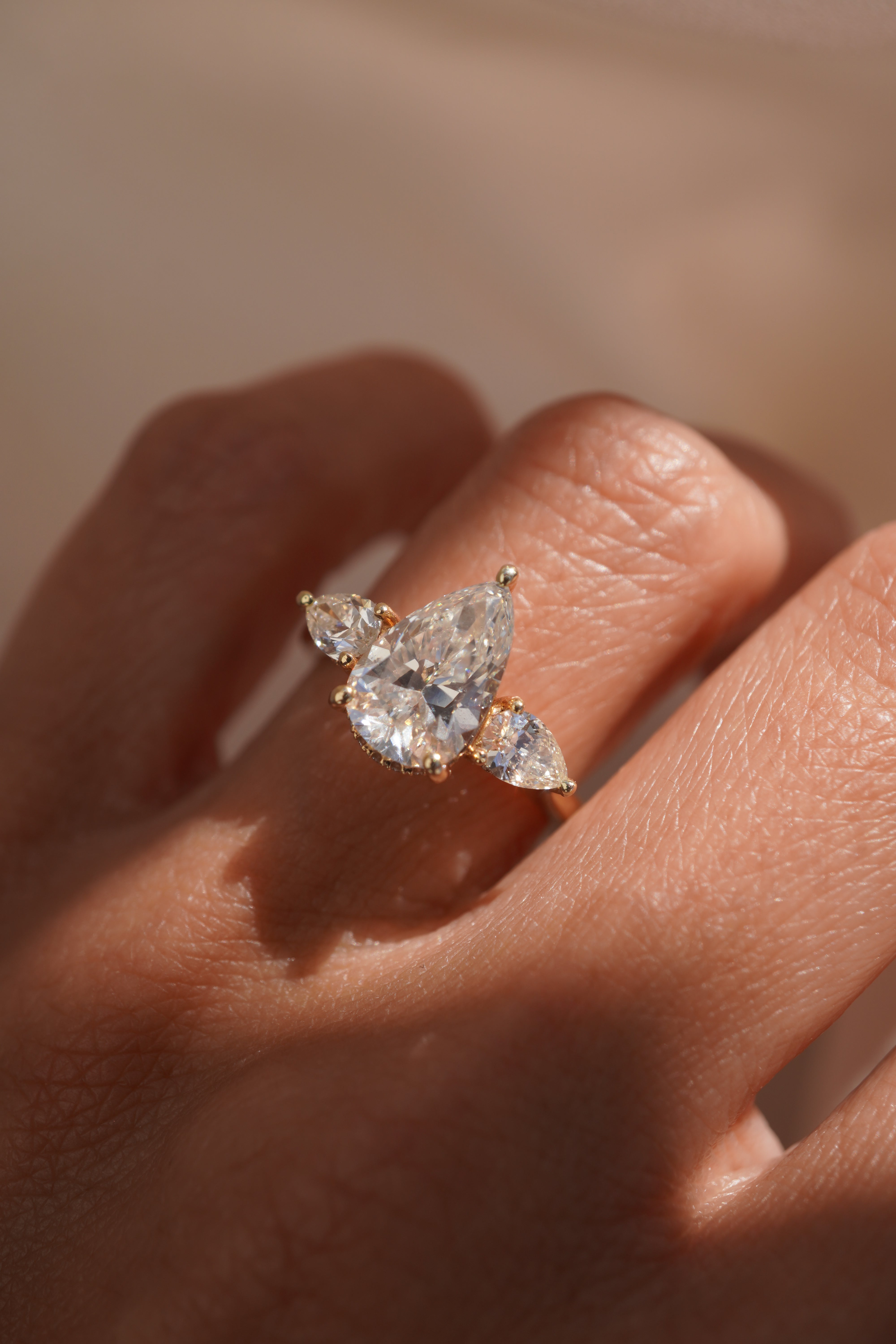 Three Stone Pear Engagement Ring