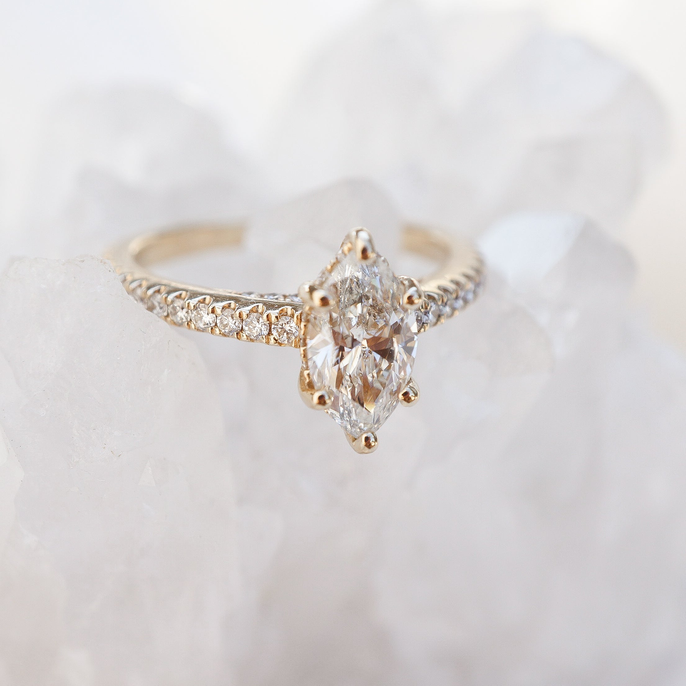 Marquise Accented Solitaire with Hidden Halo and Pave Bridge