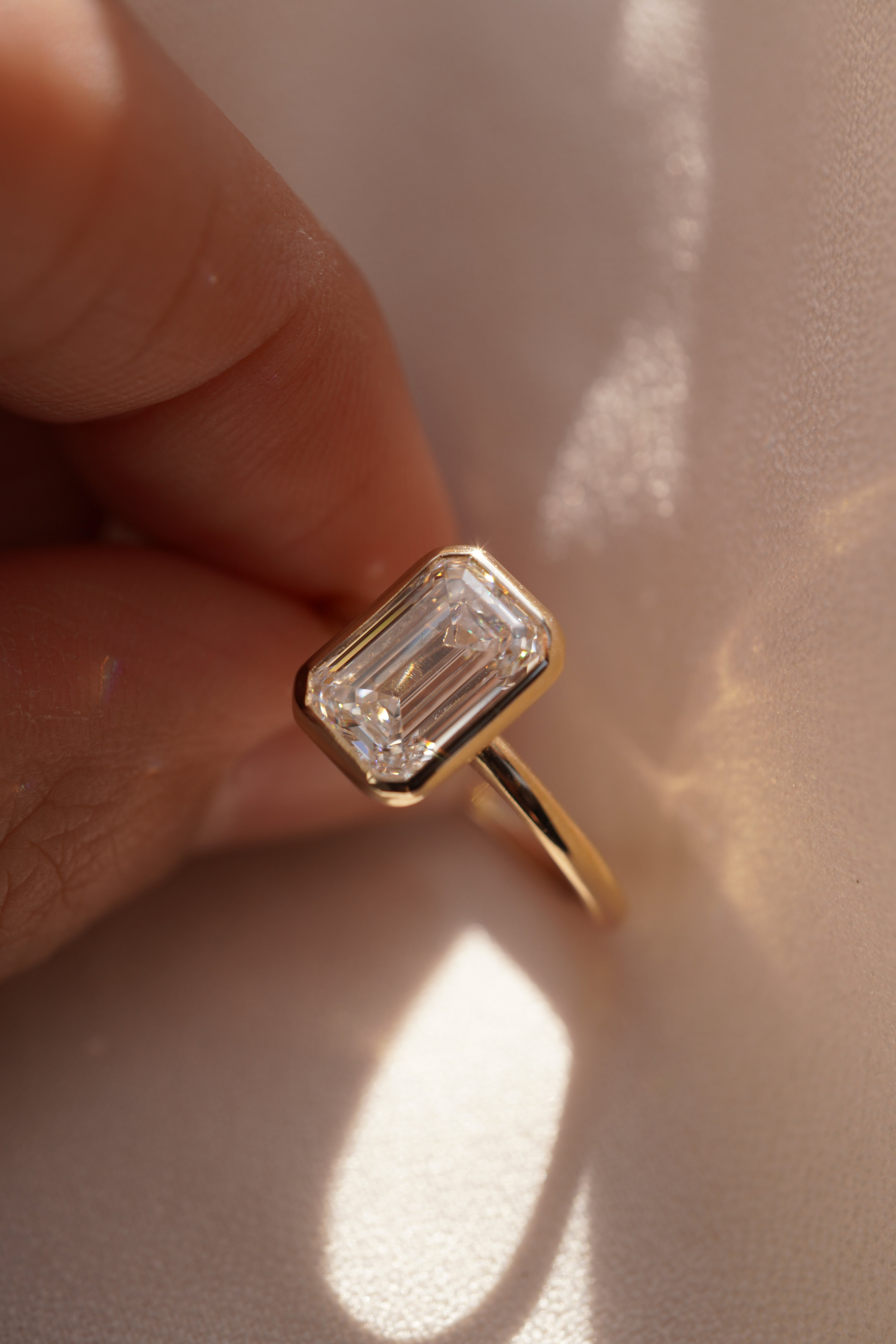 Emerald Bezel Solitaire