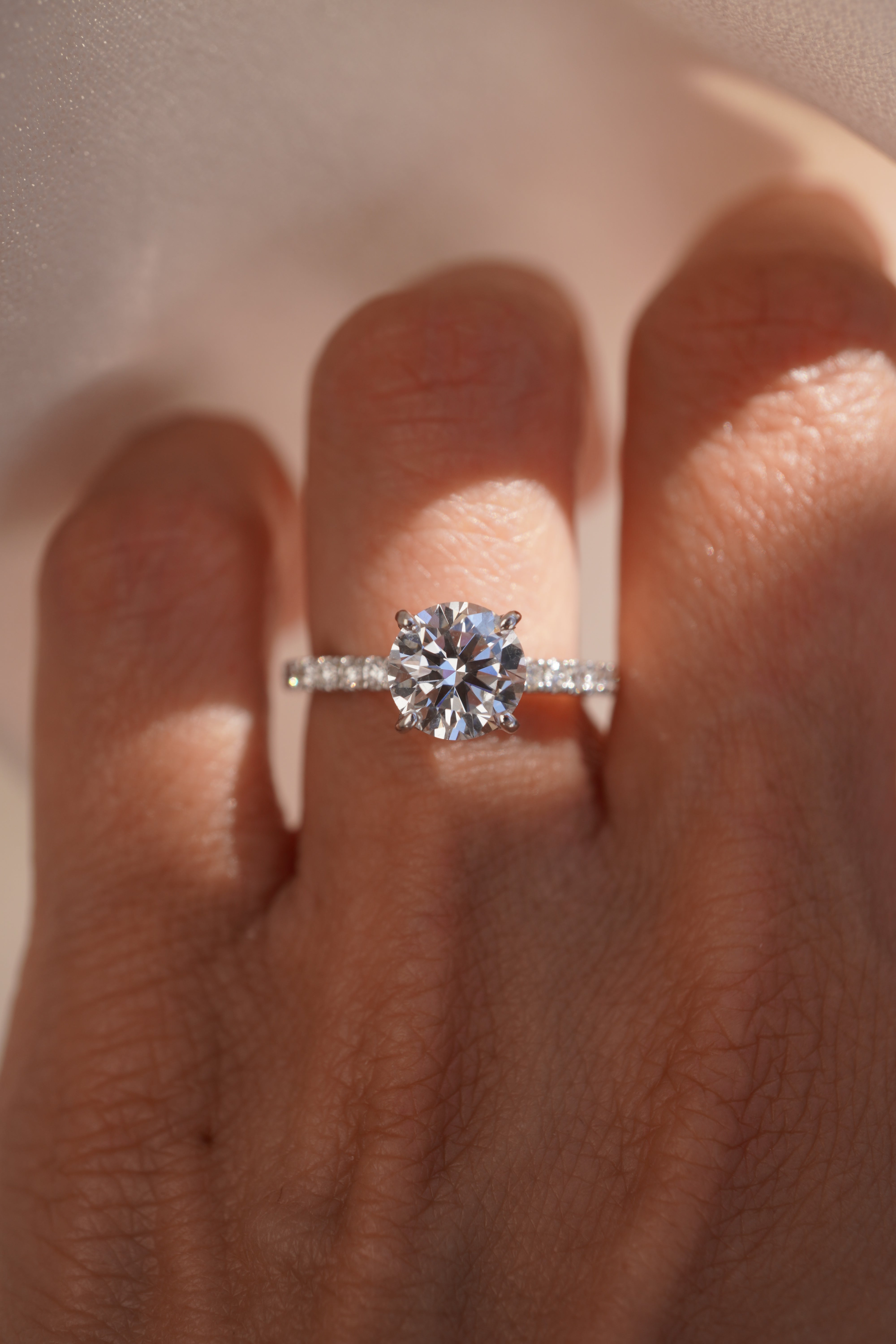 Round Accented Solitaire with Hidden Halo