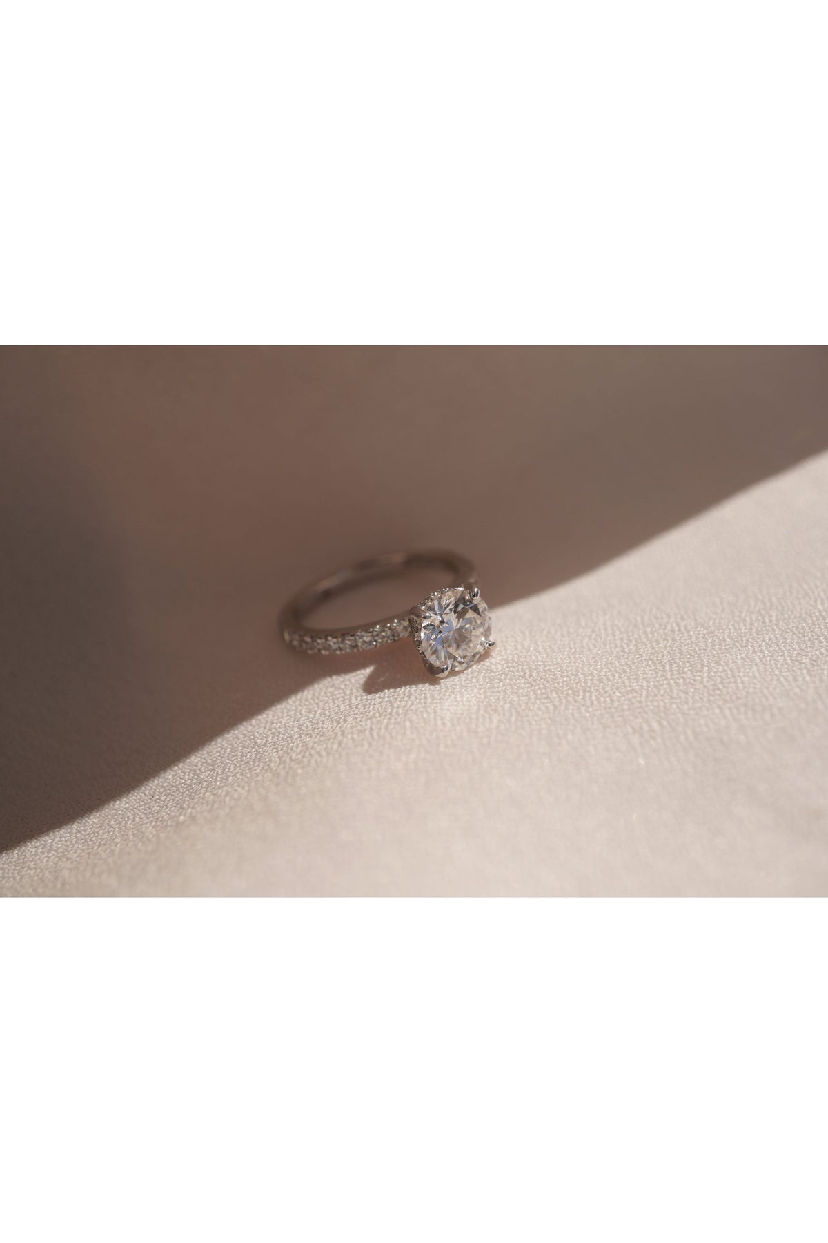 Round Accented Solitaire with Hidden Halo