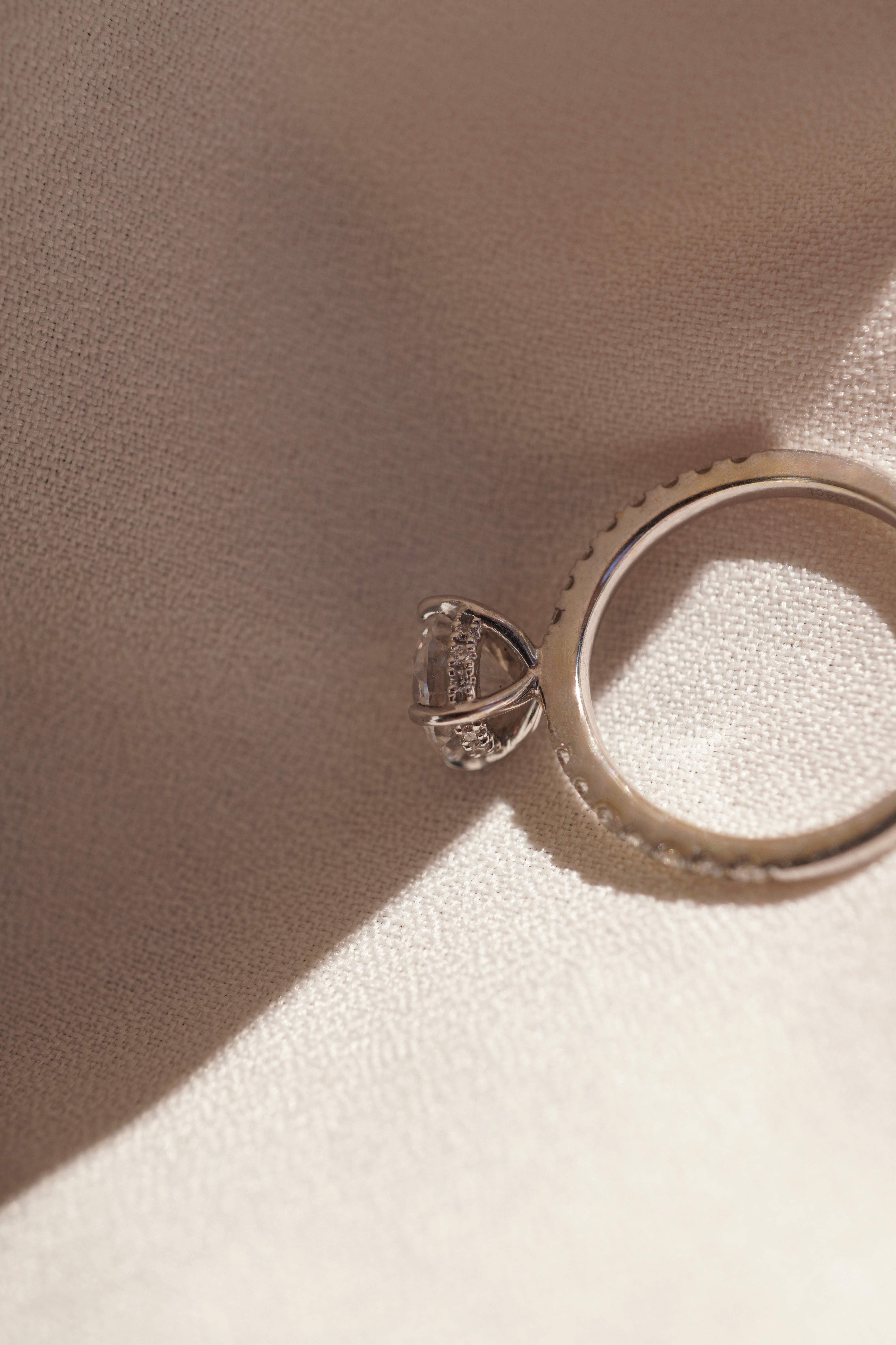 Round Accented Solitaire with Hidden Halo
