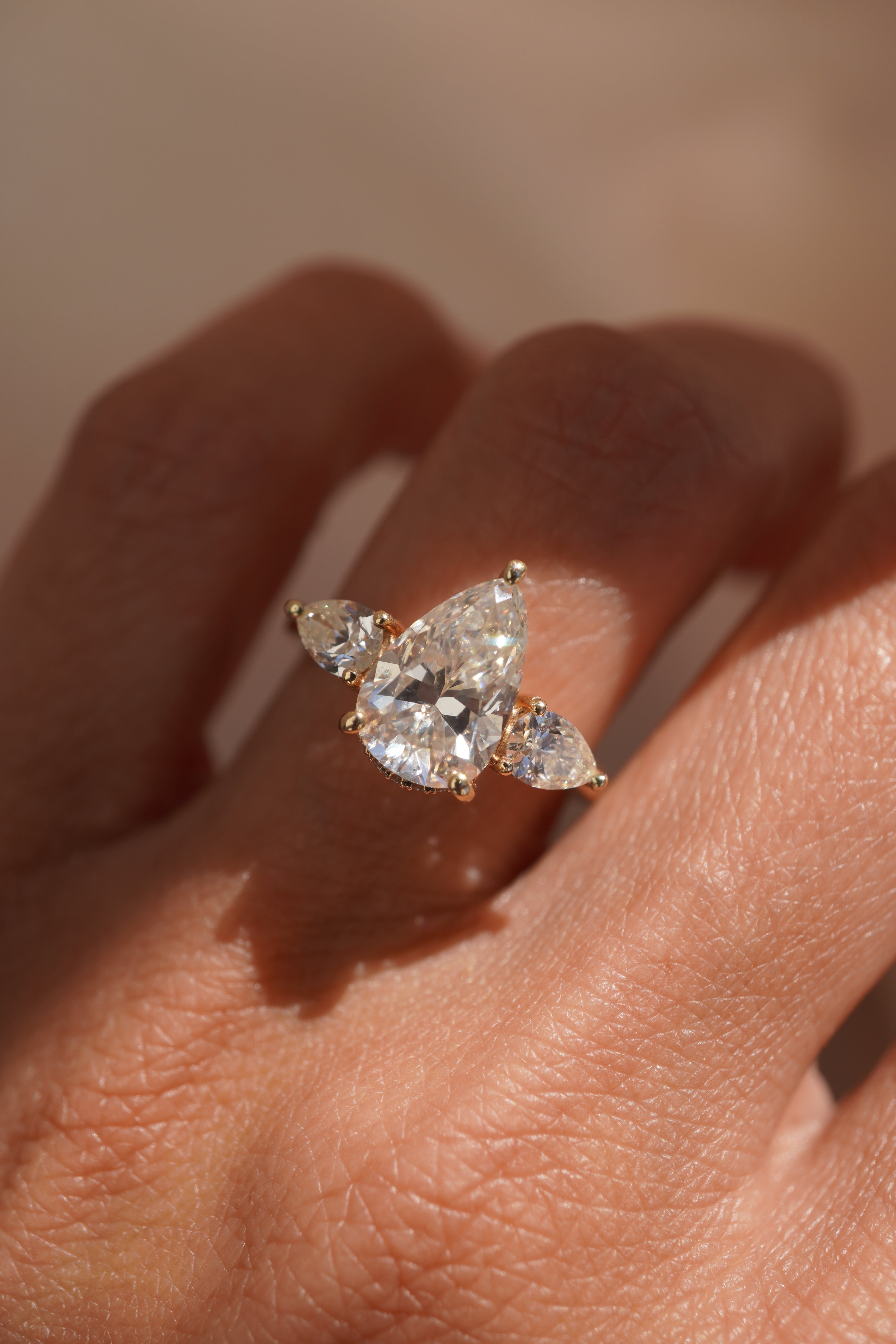 Three Stone Pear Engagement Ring