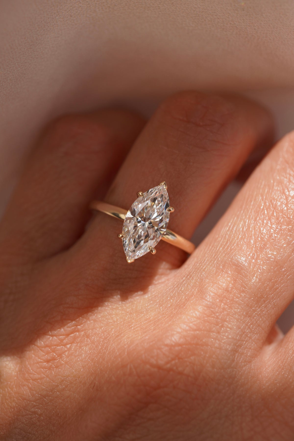 Marquise Hidden Halo Solitaire Engagement Ring