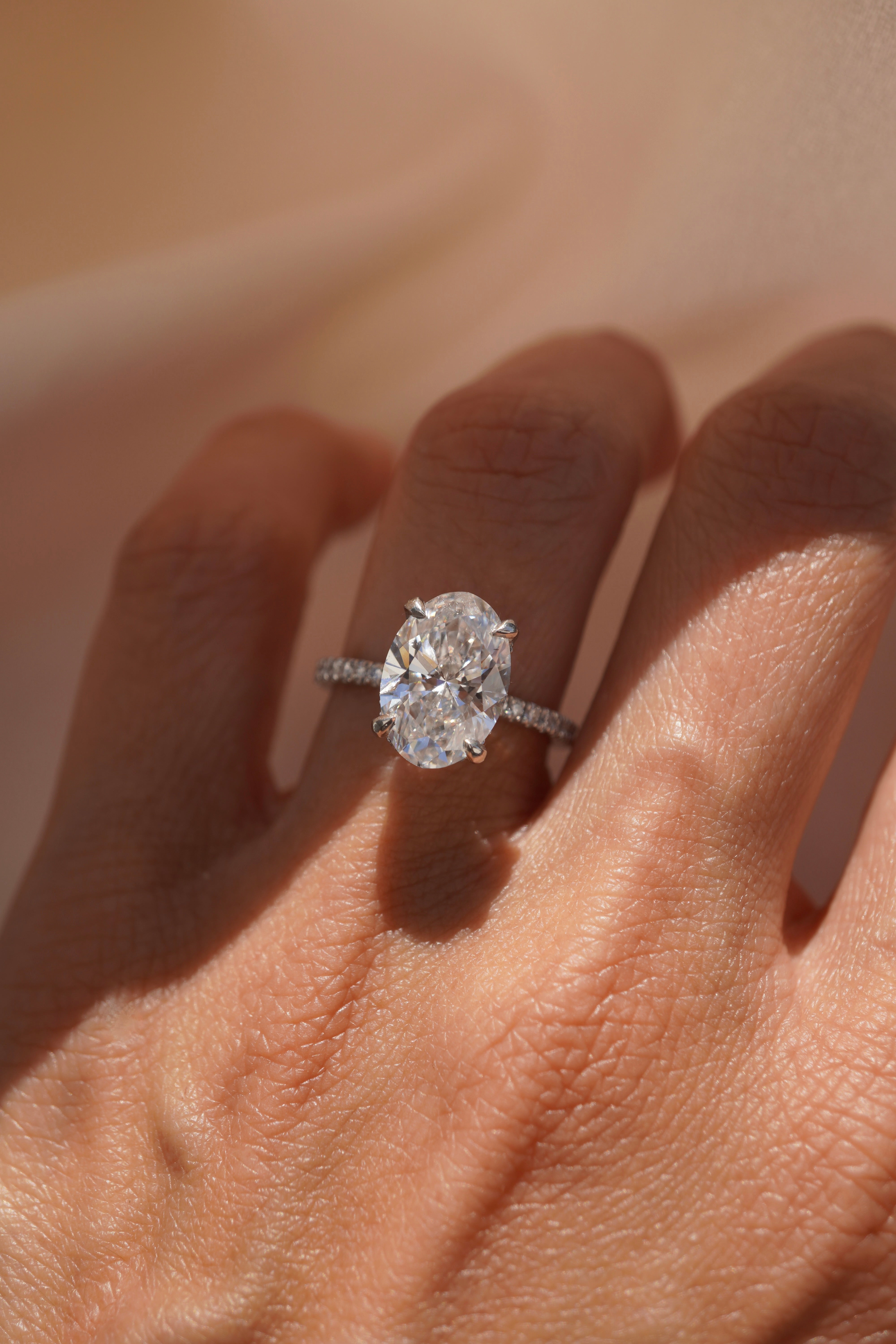 Oval Accented Solitaire with Hidden Halo