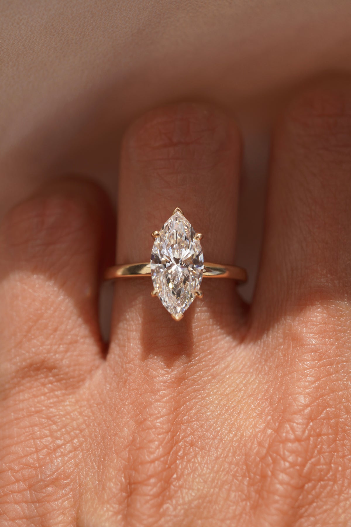 Marquise Hidden Halo Solitaire Engagement Ring