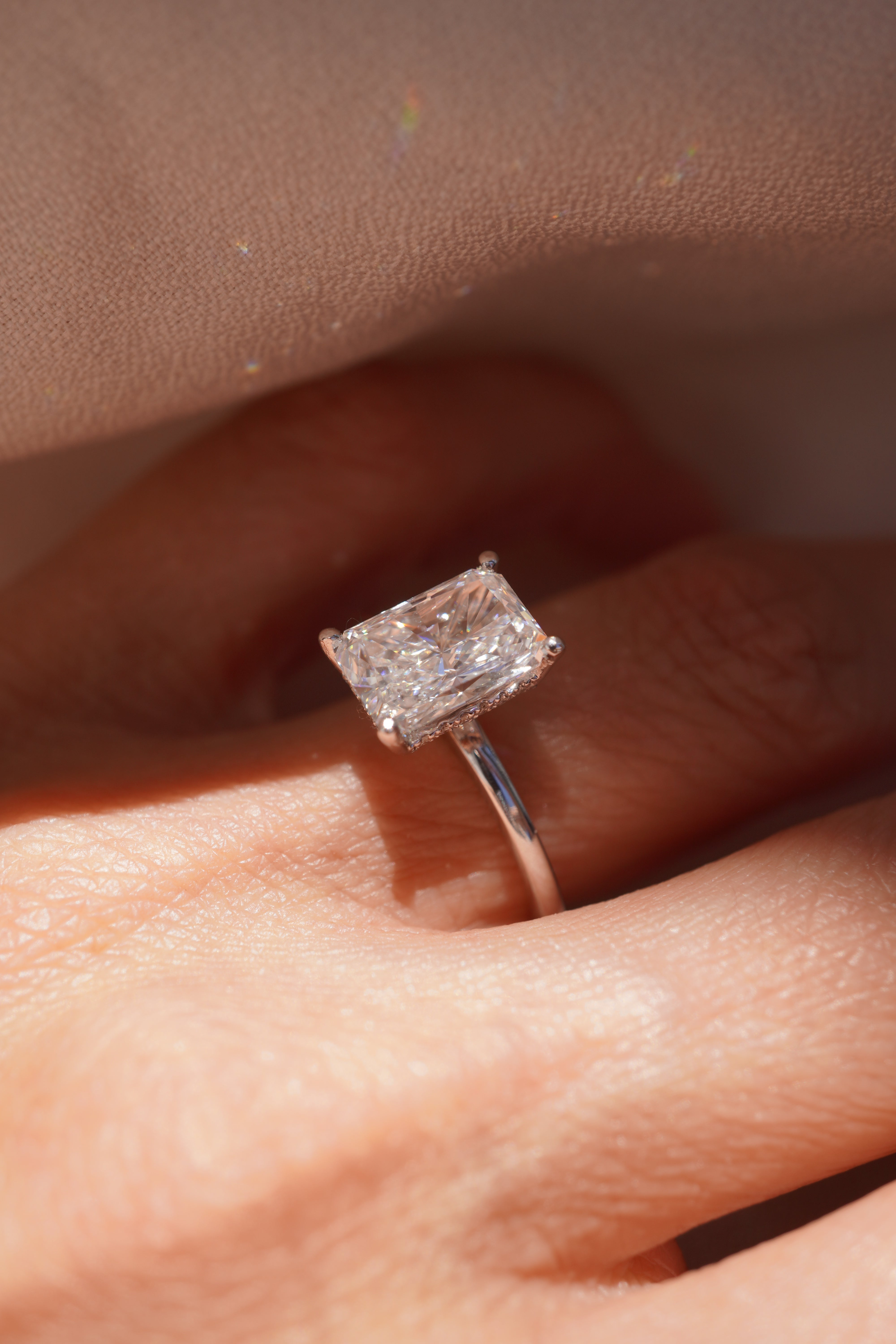 Radiant Solitaire with Hidden Halo